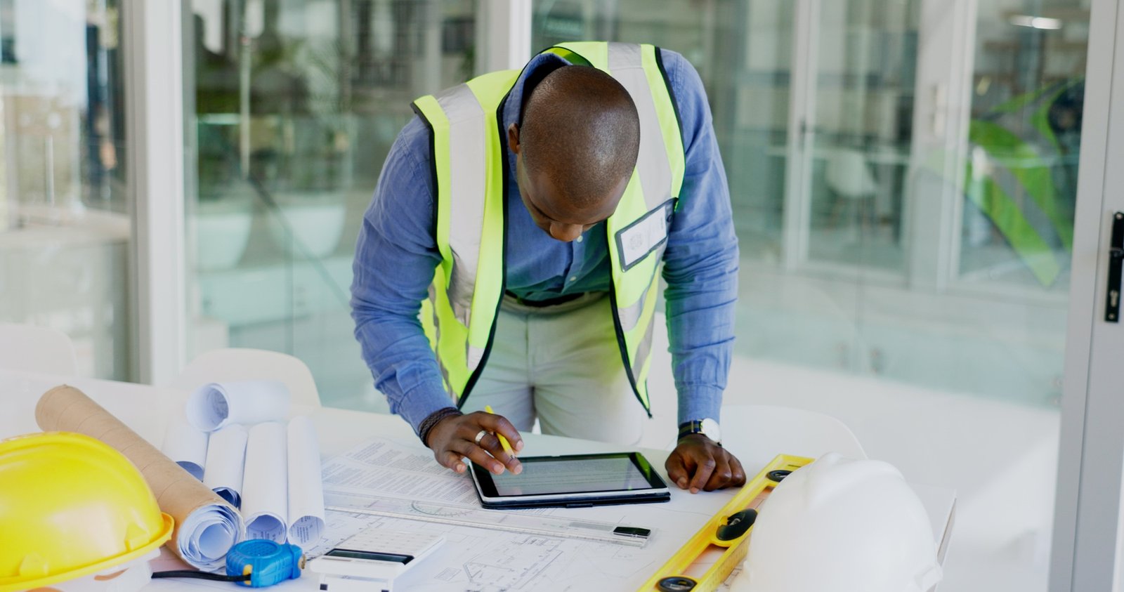 Architect tablet, drawing or black man planning infrastructure design, floor plan or property bluep
